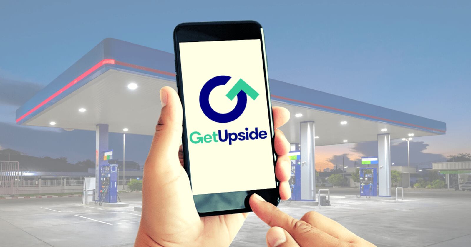 GetUpside app being used in front of a gas station.