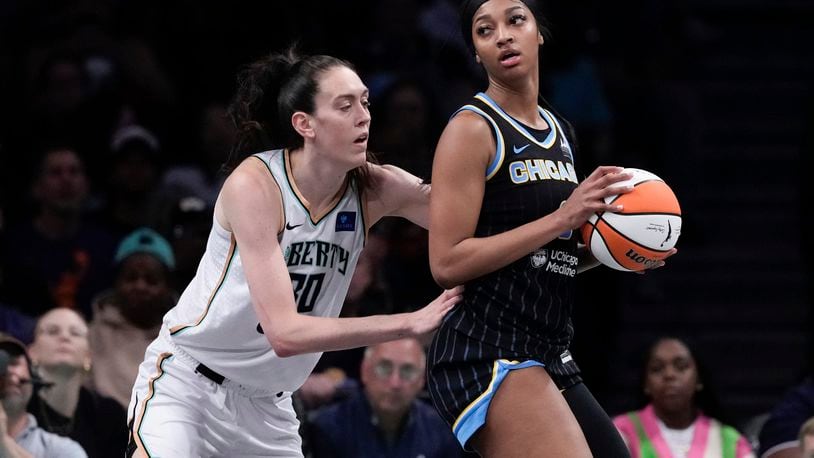 New York Liberty's Breanna Stewart (30) defends against Chicago Sky's Angel Reese (5) during the first half of a WNBA basketball game Thursday, May 23, 2024, in New York. (AP Photo/Frank Franklin II)