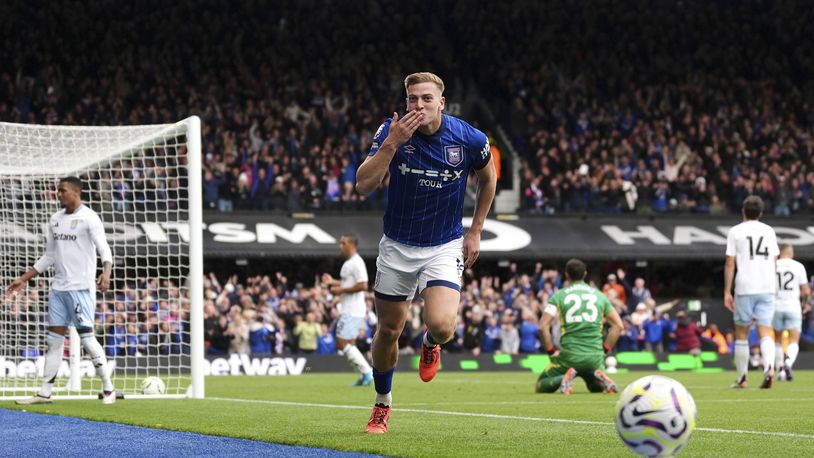 Ipswich Town's Liam Delap celebrates scoring his side's second goal during the British Premier League soccer match between Ipswich Town and Aston Villa at Portman Road, Ipswich, England, Sunday Sept. 29, 2024. (Zac Goodwin/PA via AP)