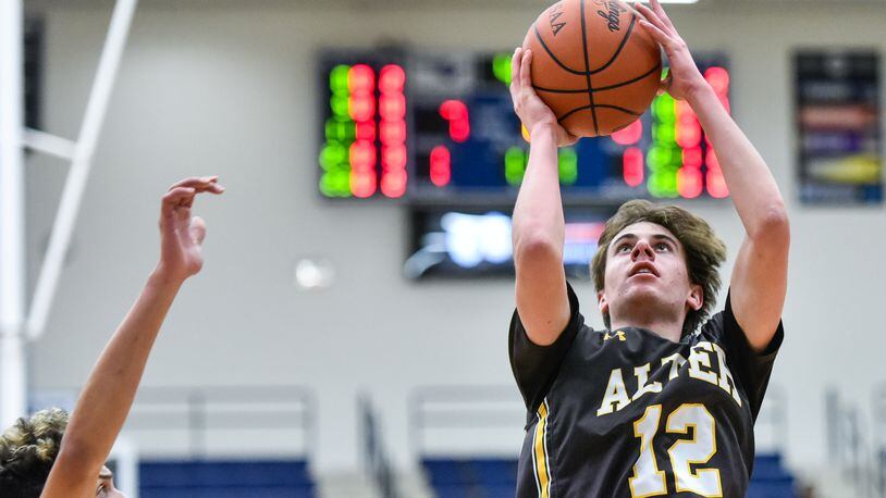 Alter’s Jack Smith puts up a shot. NICK GRAHAM/STAFF