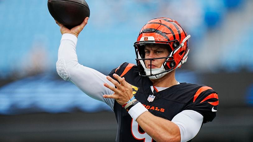 Cincinnati Bengals quarterback Joe Burrow warms up before an NFL football game between the Carolina Panthers and the Cincinnati Bengals, Sunday, Sept. 29, 2024, in Charlotte, N.C. (AP Photo/Rusty Jones)