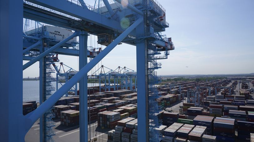 FILE - Shipping containers are stacked in the Port of New York and New Jersey in Elizabeth, N.J., May 20, 2021. (AP Photo/Seth Wenig, File)