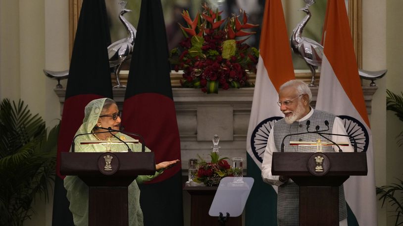 Bangladesh Prime Minister Sheikh Hasina, left, talks to her Indian counterpart Narendra Modi during a press statement after their delegation level meeting in New Delhi, India, Saturday, June 22, 2024. (AP Photo/Manish Swarup)
