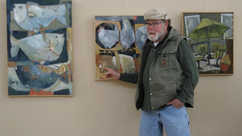 Douglas Fiely, seen here discussing his works at The Art Gallery at the Centerville Police Department in 2017, died Sept. 11. He was 74. CONTRIBUTED