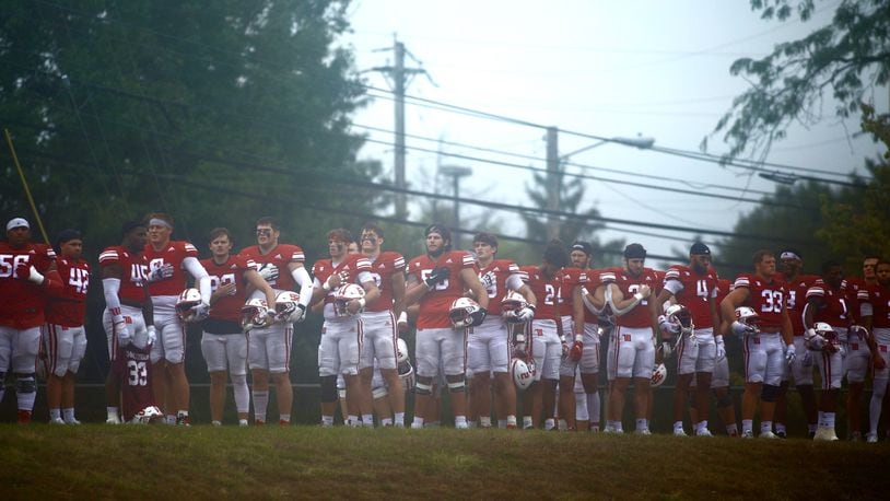 Wittenberg stands for the national anthem before a game against Howard Payne at Edwards Maurer Field in Springfield. David Jablonski/Staff