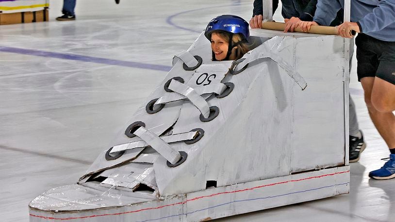 Several events will be held in Clark and Champaign Counties this weekend, including the Cardboard Classic at NTPRD Chiller. In this file photo from last year, Paige Baggett rides in her Converse All-Star bobsled during one of the heats at the National Trail Parks and Recreation Cardboard Classic Bobsled Races. FILE/BILL LACKEY/STAFF