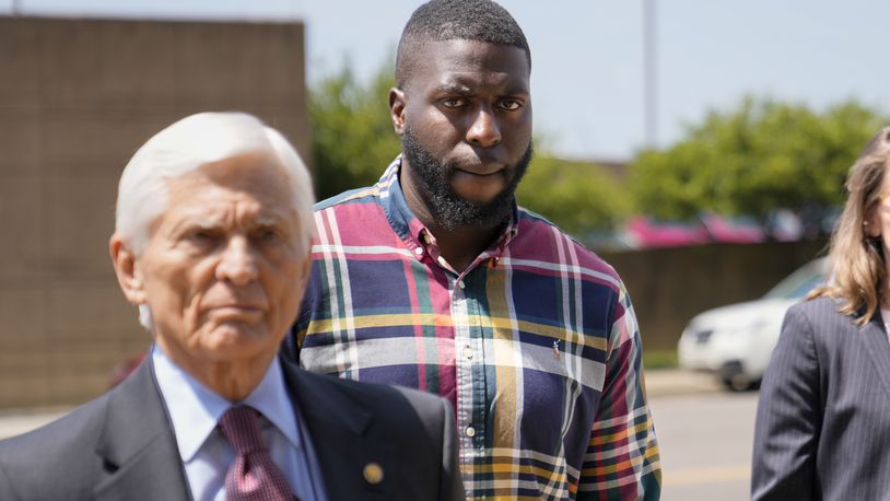 Emmitt Martin III, a former Memphis Police Department officer, second from left, accused of killing Tyre Nichols, walks into federal court Friday, Aug. 23, 2024, in Memphis, Tenn. (AP Photo/George Walker IV)